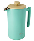 Turquoise pitcher with a beige lid and handle on a white background